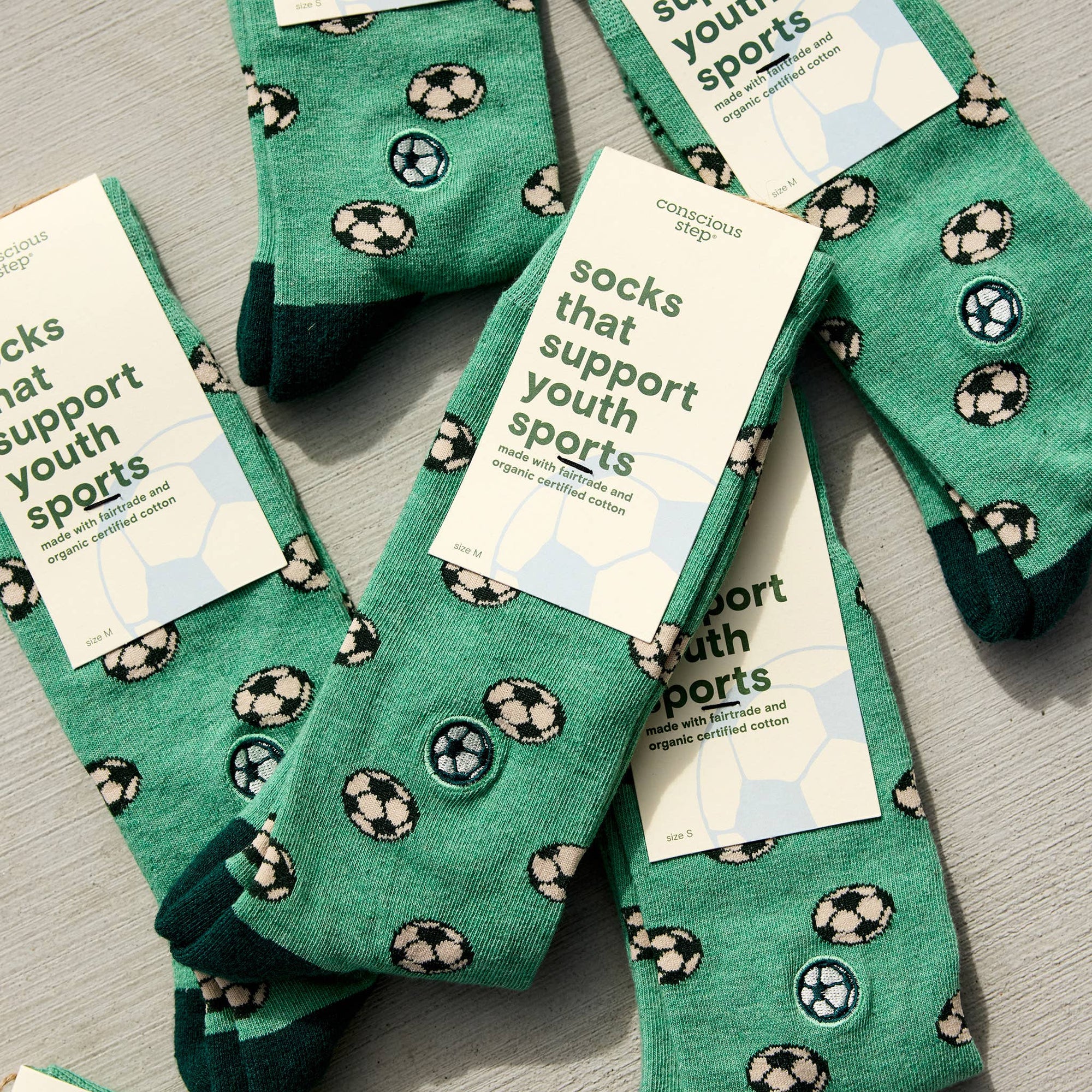 Socks that Support Youth Sports | Green Soccer Balls