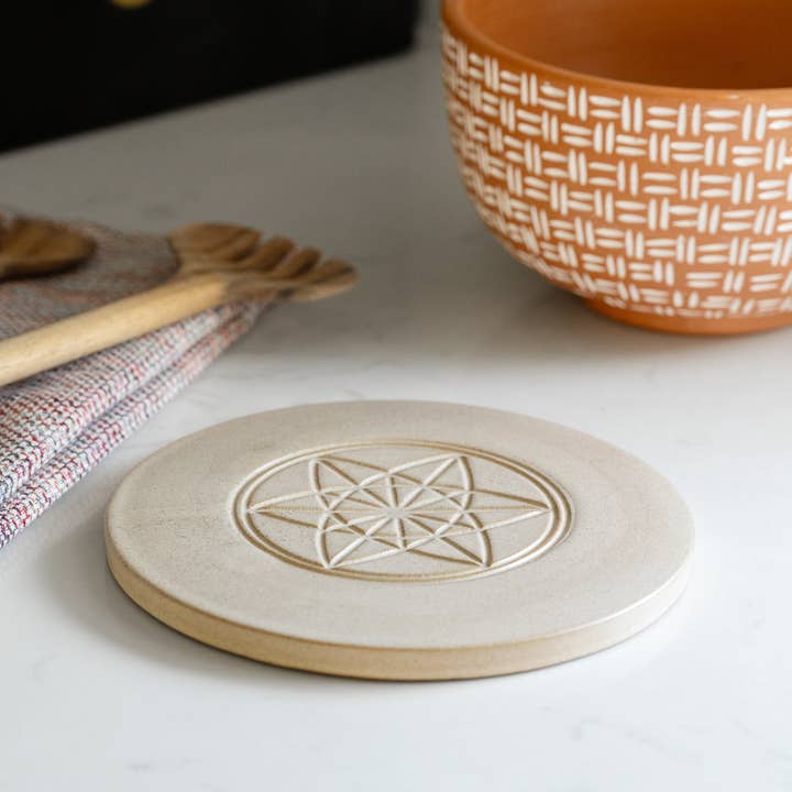 Tan Ceramic Equilibrium of Life Trivet (7&quot; D)
